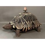 A French fibre glass Tortoise opening to a ice bucket with brass head and feet (43cm length x 27cm