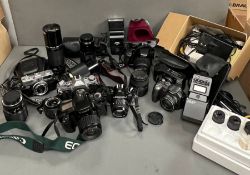 A large selection of camera, lens and flashes, various makers including Pentax, Cannon and Minolta
