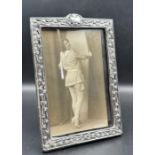 A good Art Nouveau silver embossed photograph frame, Birmingham 1901, together with period 1915