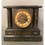 An eight day wooden cased mantle clock hand painted in a slate and marble style