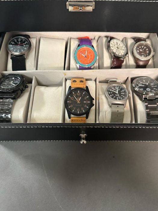 A selection of wristwatches in display case to include: Bulova, Geneva, Skmei, Infantry, 18 in - Image 4 of 6