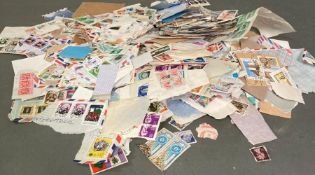 A quantity of loose UK and World stamps