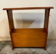 A yew Mid Century magazine rack