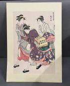 A Japanese wood block print of three ladies.