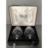 A pair of Waterford crystal brandy balloons. Boxed