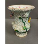 A 19th century vase in the manner of Meissen with bird decoartion.