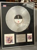 Platinum disc sales for Chris Rea Dancing with Strangers