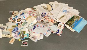A quantity of UK and world stamps and a small selection of first day covers