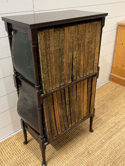 An Edwardian rosewood floor standing bookcase containing The Encyclopaedia Britamica books (H88cm