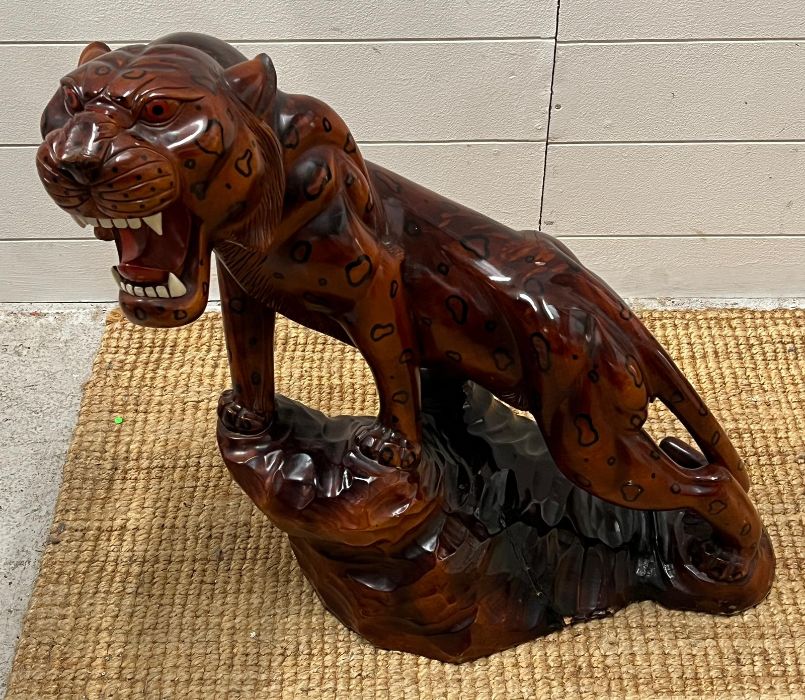 A Chinese carved prowling tiger (H60cm) AF