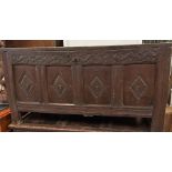 An oak early 18th Century four carved panelled coffer. (H62cm D53cm W120cm)