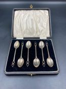A boxed set of six Art Deco silver teaspoons by A J Bailey, hallmarked for Birmingham 1913.