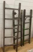 Two vintage wooden ladders