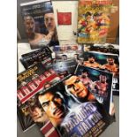 A large selection of official boxing programs