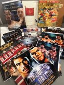 A large selection of official boxing programs