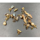 A selection of seven 9ct gold earrings various style and settings