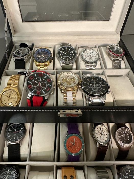 A selection of wristwatches in display case to include: Bulova, Geneva, Skmei, Infantry, 18 in - Image 6 of 6