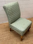 A bedroom chair on cabriole legs