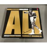 Hard back book "The Offical Treasures" of Muhammad Ali