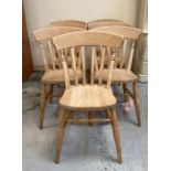 A set of eight pine slat back farmhouse chairs