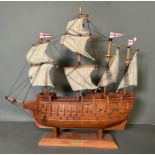 A wooden scale model of Henry VIII's ship the Mary Rose