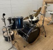 A Tama drum kit to include: Sabian high hat, a selection of Paiste symbols, Custom Percussion drum