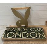 A Playboy Club London sign including iconic Bunny head.