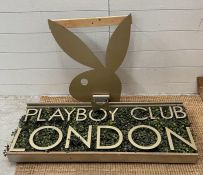 A Playboy Club London sign including iconic Bunny head.