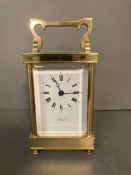 A brass carriage clock by Agetus