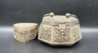 Two white metal Indian boxes, one heart shaped.