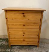 A four drawer pine chest of drawers (H90cm W78cm D40cm)