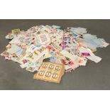 A quantity of loose world stamps to include Jordan, Spain and Kuwait