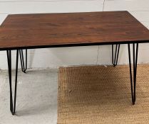 An industrial style table on hair pin legs (H75cm W120cm D60cm)