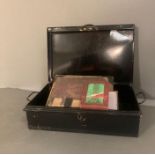 A metal deed box containing two early 19th Century scrap books with a variety of handwritten