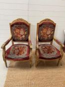 A pair of gilt frame Baroque style throne chairs