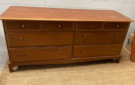 A large chest of drawer/side cabinet with four small drawers and four long drawers by Stags