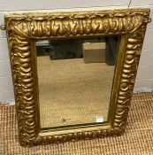 A plaster gilt framed mirror 65cm x 48cm