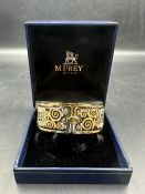 Michaela Frey, Wien. A Viennese enamel bangle with gilt metal mount