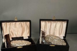Two cased Broadway brush and comb sets with silver mounts hallmarked for Birmingham