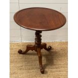 A circular occasional table, the pedestal table on spiral support and trip pod legs (H60cm Dia54cm)