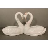 A pair of Lladro necking swans