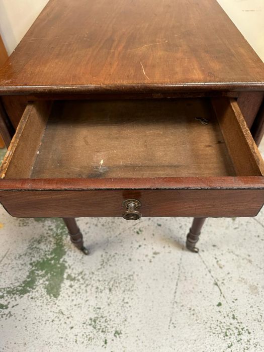 A mahogany drop leaf Pembroke table on castors - Image 3 of 4