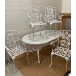 A white painted iron garden table and four chairs (H68cm W156cm D89cm)
