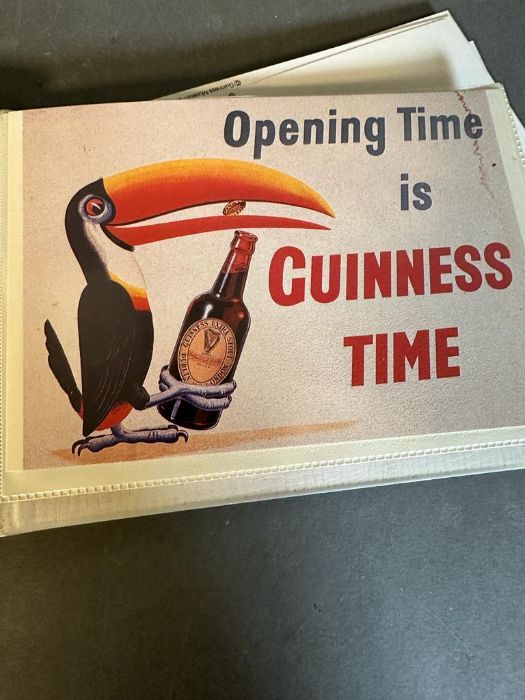 An album of vintage Guinness postcards