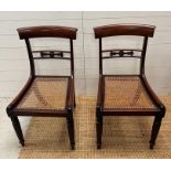 A pair of William IV hall chair