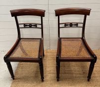 A pair of William IV hall chair