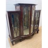 A mahogany three cupboard bow fronted display cabinet with ornate carved glazed doors (H135cm Q140cm