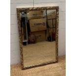 A wooden gold painted hall mirror with cross etching to glass 56cm x 81cm