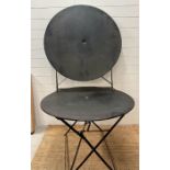 Two black painted metal garden table (Approximate Height 73cm x 96cm Diameter)