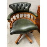 A leather Captains desk chair